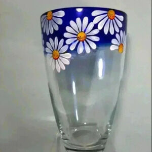 Hand  painted art glass vase. Cobalt blue and clear glass with raised daisies.
